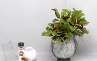 A vase full of greens