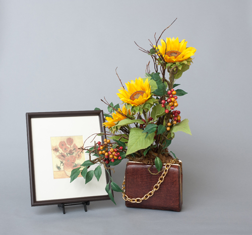 Bloomin’ Bag flower arrangement and framed artwork